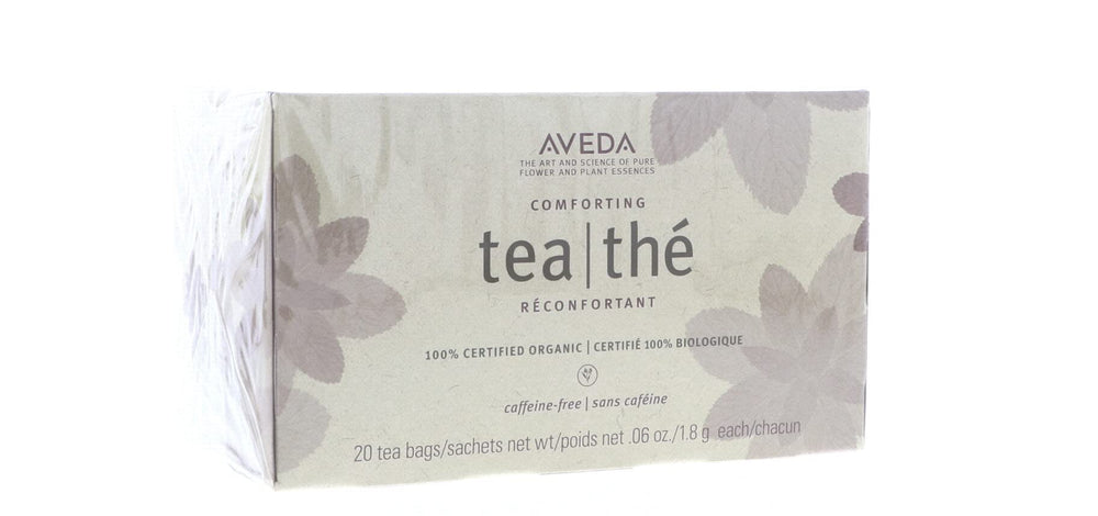 Aveda tea in hands conveying comfort and easy preparation on the go