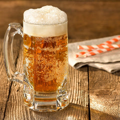 A&W being poured displaying creamy foam and refreshing presentation