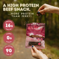 Ayoba single 2 oz pack opened with pieces visible, shows ready-to-eat convenience