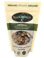 BACK ROADS spoonful of granola over milk demonstrating cereal use and convenience