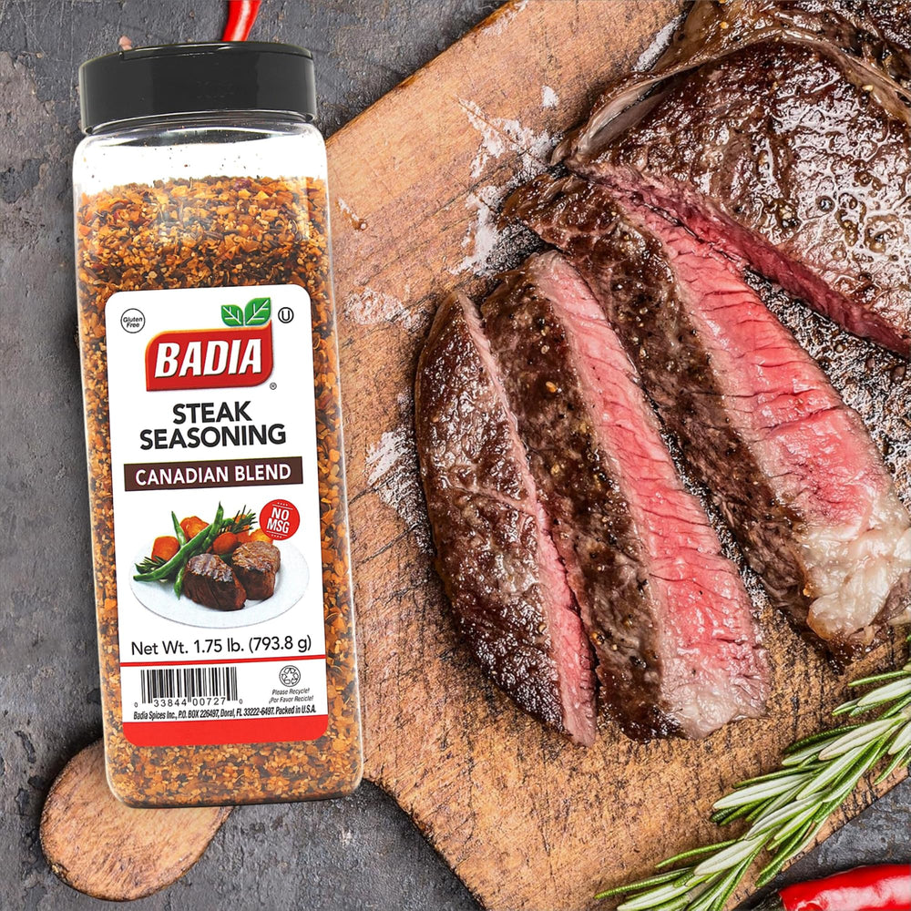 Badia seasoning heaped on wooden spoon showing coarse texture and robust flavor