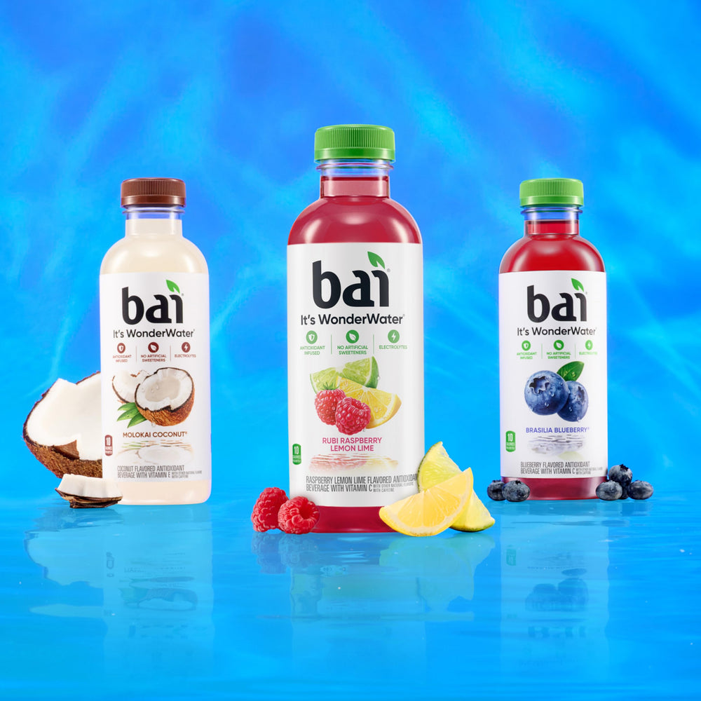 Hand holding Bai bottle to show size and easy grab convenience