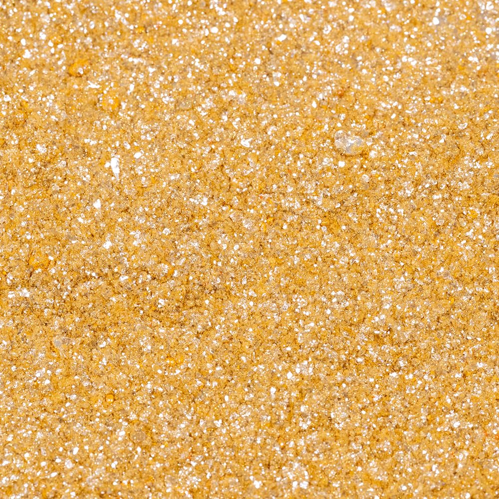 Bakell gold Tinker Dust 5g jar beside a coin showing compact size and portability