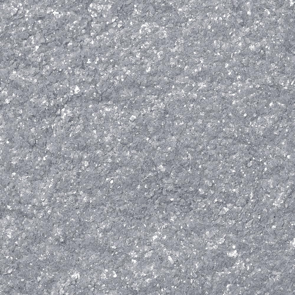 Bakell silver Tinker Dust dispersed in cocktail creating swirling pearlescent visual effect