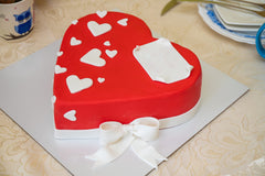 Bakerpan decorated cake covered in red fondant showcasing smooth finish