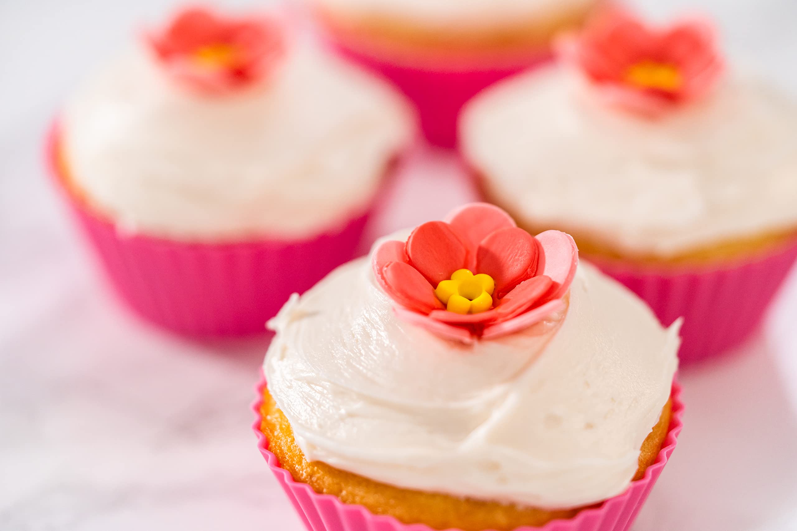 Bakerpan finished cake decorated with gum paste flowers showcasing elegance