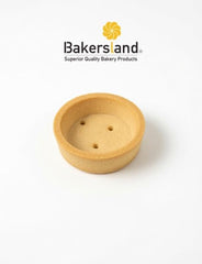 Bakersland tart shells next to ruler for size clarity and consistent portions
