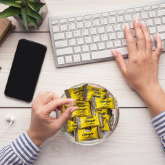 Bali's Best chew held in hand to show size and convenient on-the-go portioning