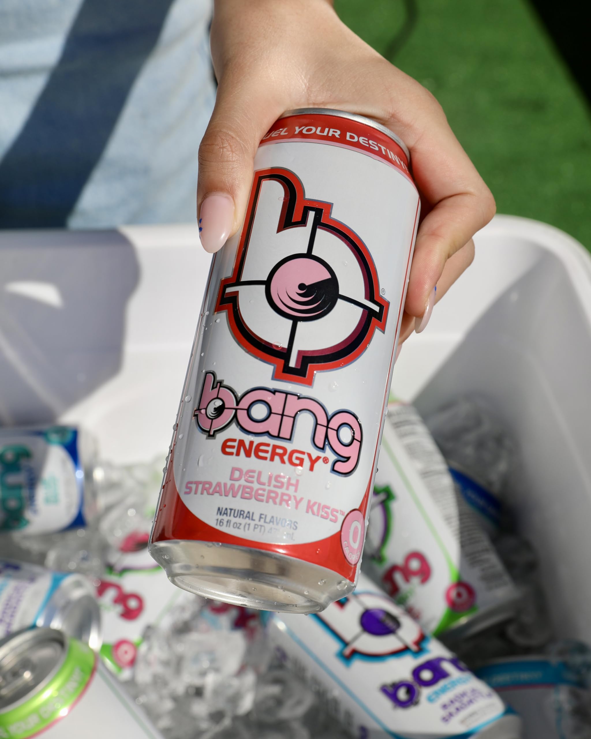 BANG Delish Strawberry Kiss can beside gym gear, demonstrates energy boost for workouts