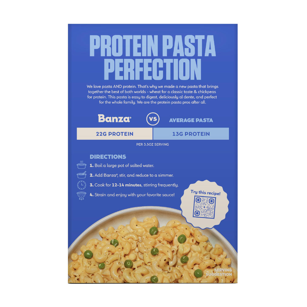Banza elbow pasta beside measuring cup illustrating portion size