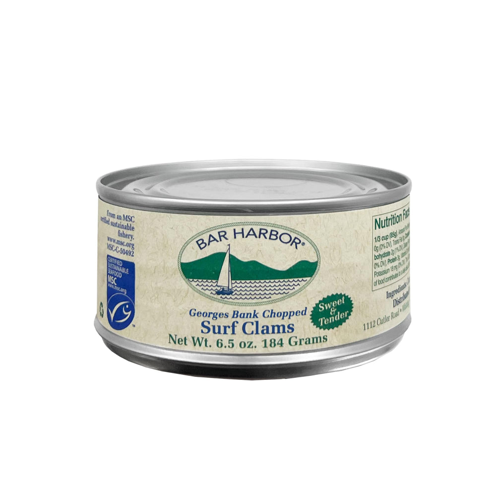 Bar Harbor can beside a spoon to illustrate 6.5 oz scale and portion