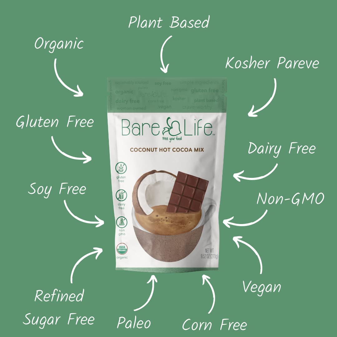 Bare Life prepared cup of hot cocoa on wood displaying creamy dairy-free foam