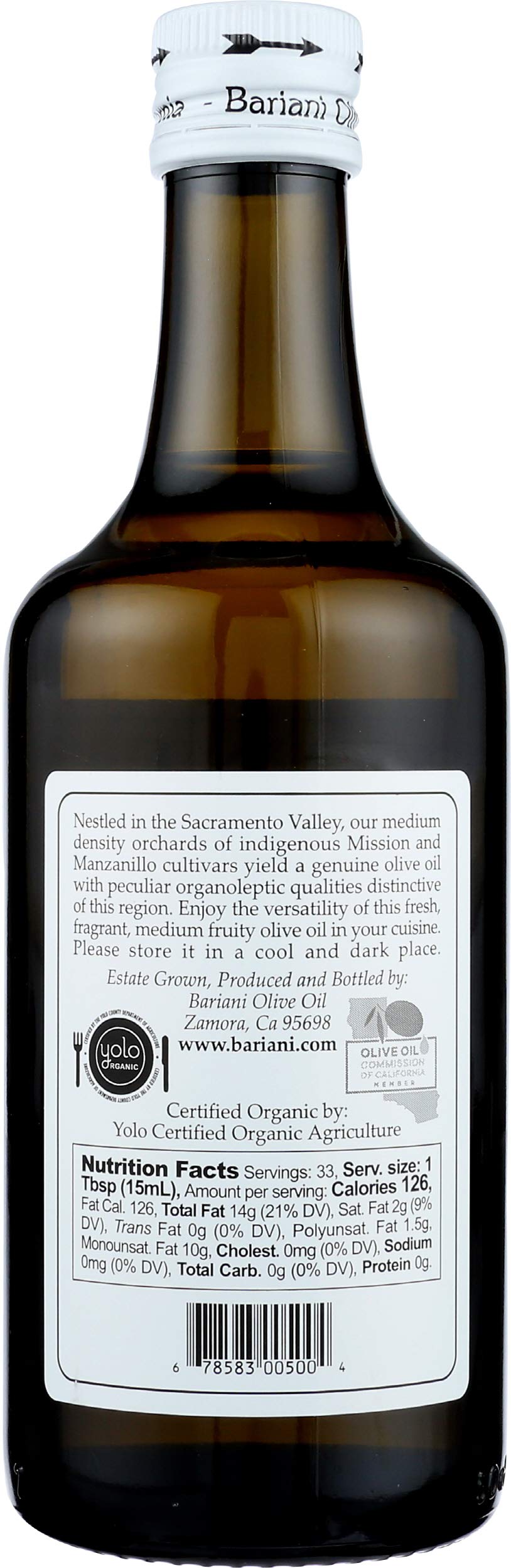 Bariani oil pouring from bottle into small dish to show pour and viscosity