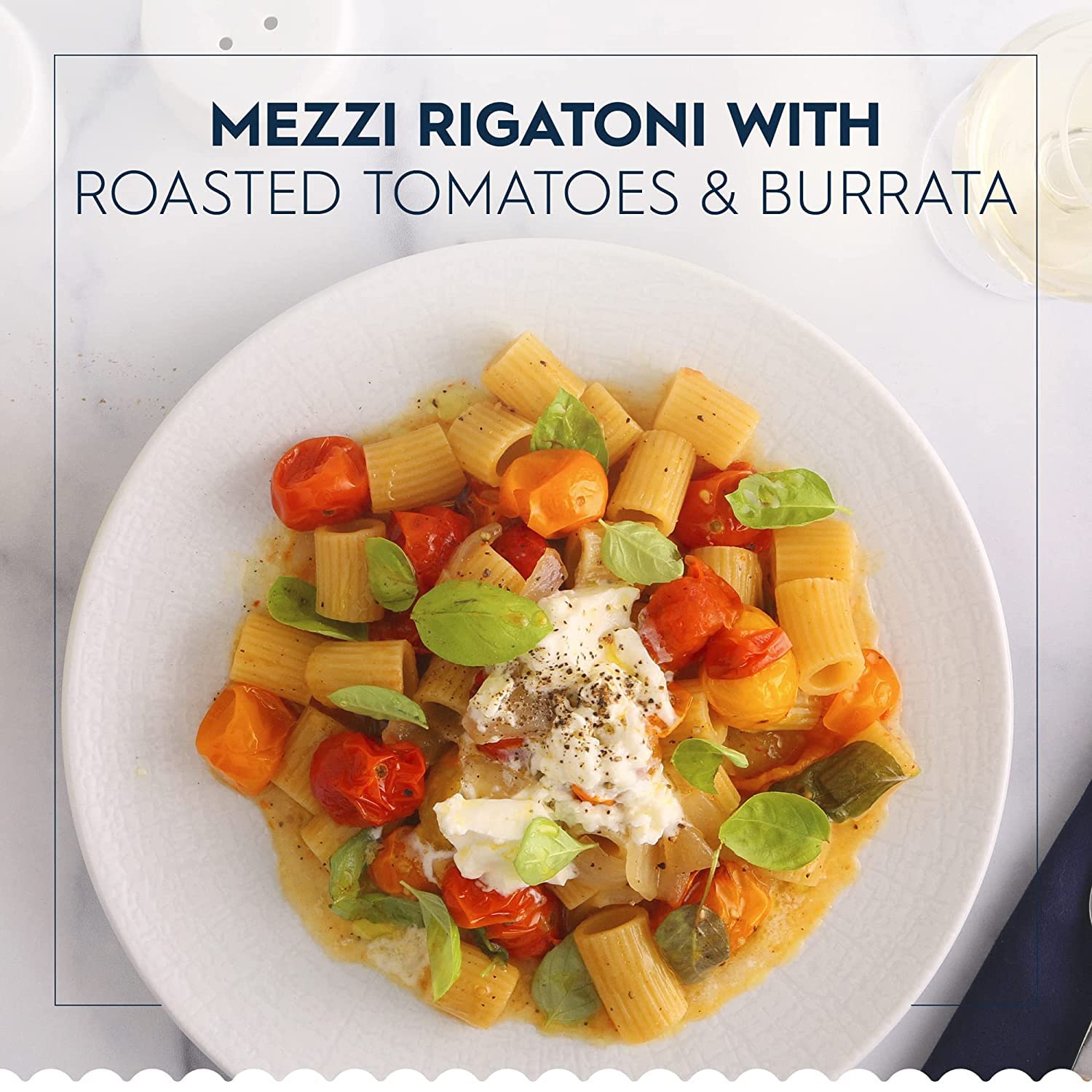 Barilla mezzi rigatoni coated in tomato sauce, demonstrating excellent sauce retention