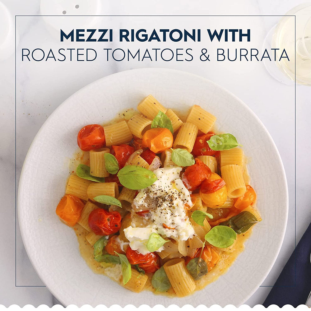 Barilla mezzi rigatoni coated in tomato sauce, demonstrating excellent sauce retention