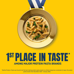 Close-up of uncooked Barilla Protein+ penne texture highlights hearty wheat and legume blend