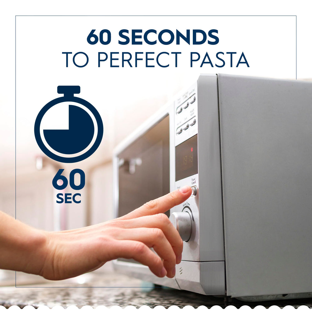 Opened Barilla pouch being heated in microwave for fast meal prep benefit