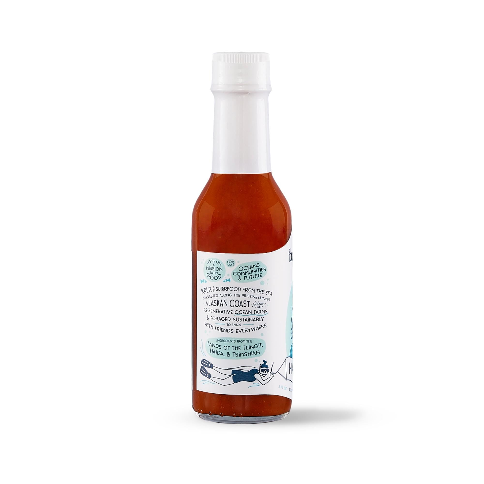 Barnacle Foods Habanero sauce pouring to show thickness and fruity heat
