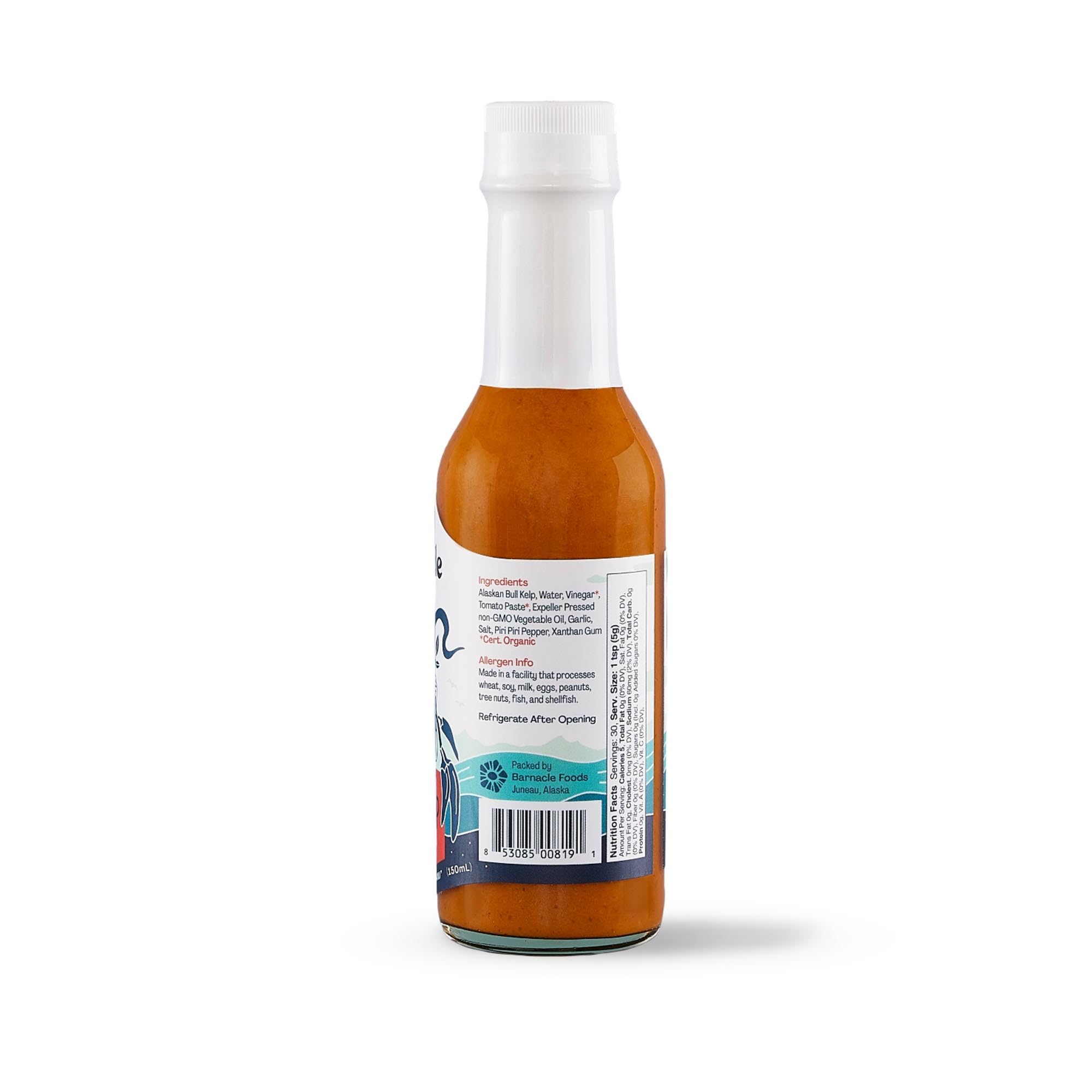 Barnacle Foods sauce drizzled over grilled salmon enhancing seafood taste
