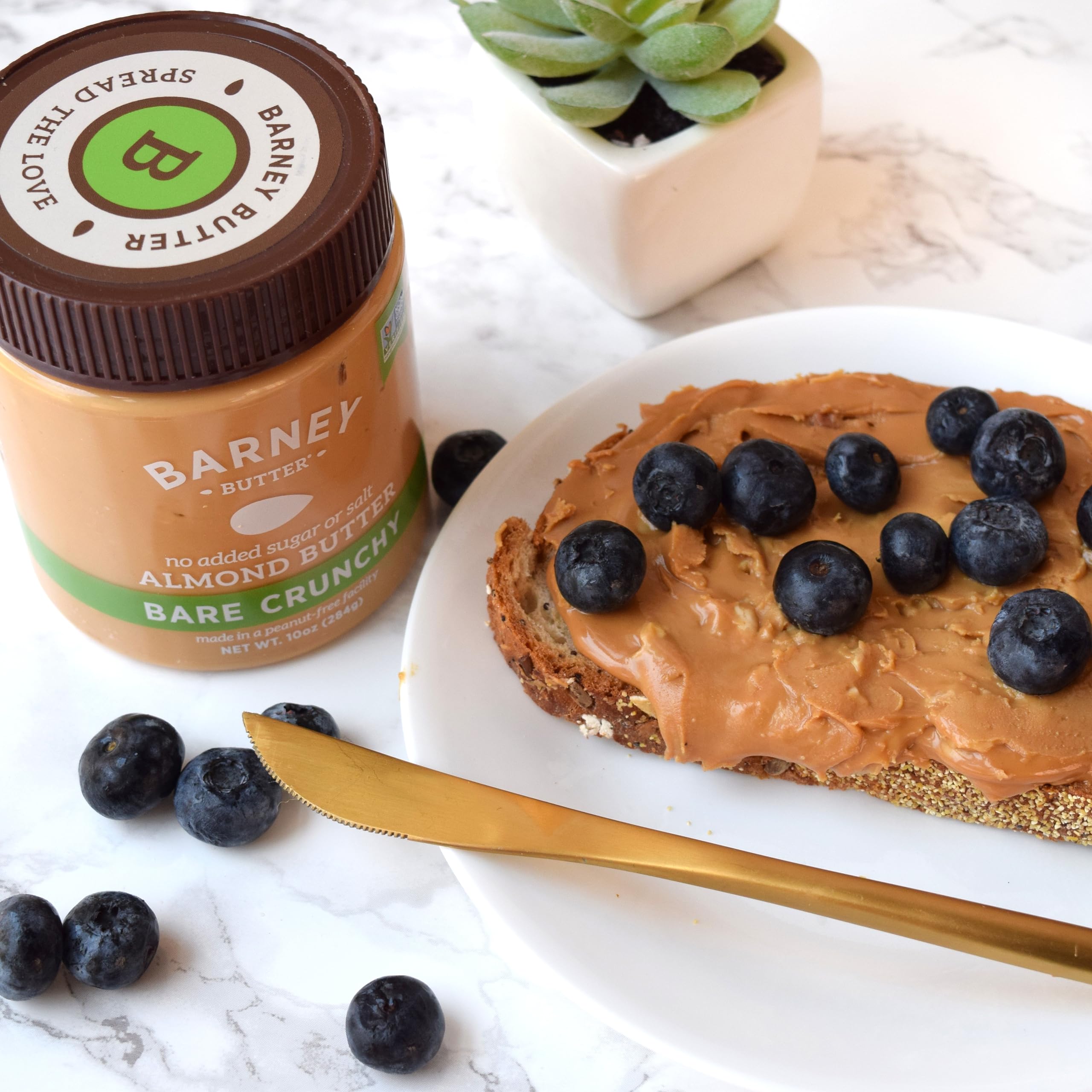 Barney Butter spread on toast in kitchen scene showing easy breakfast benefit