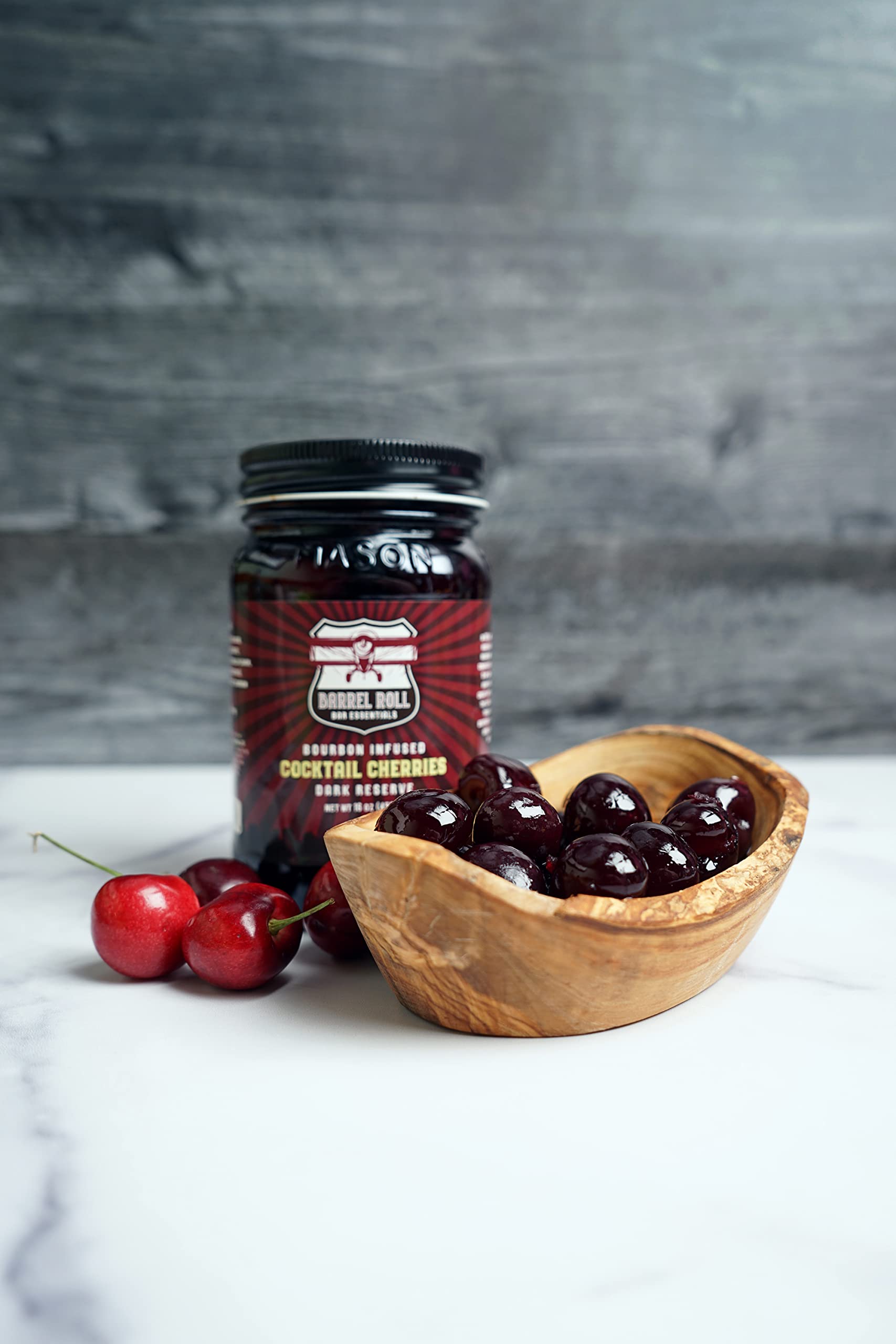 Barrel Roll Bar Essentials cherries on cheese board adding sweet contrast