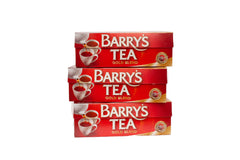 Barry's Tea Gold teabag close-up showing fine black tea leaves for consistent flavor