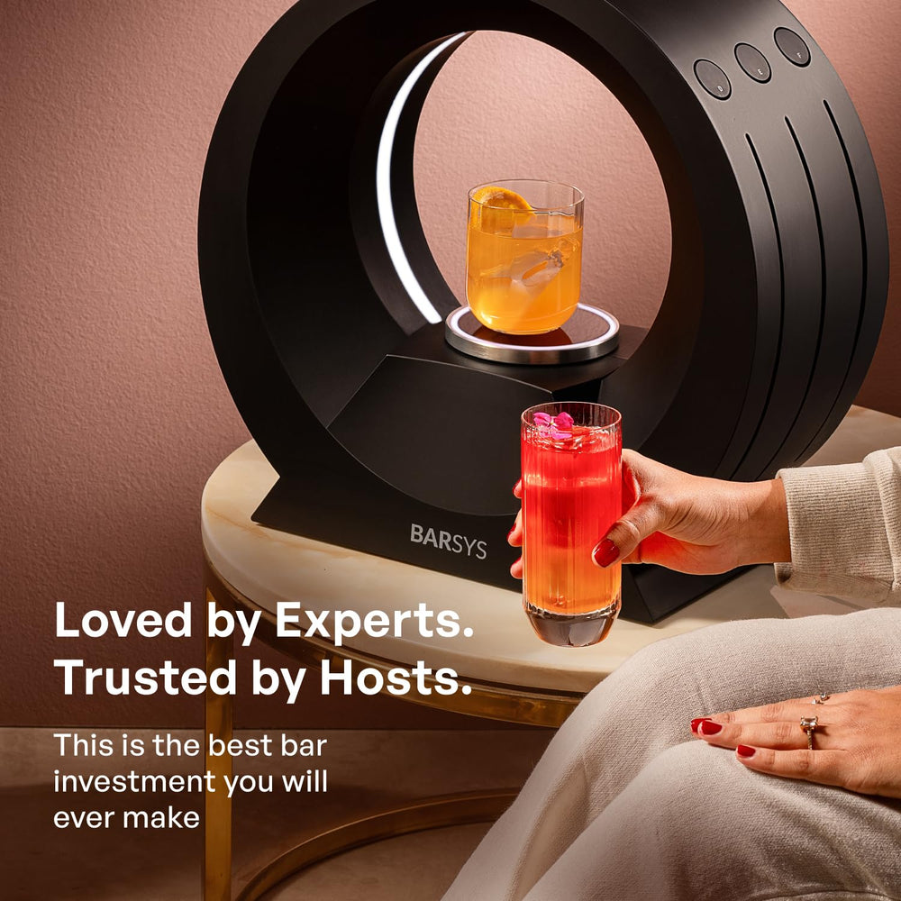 Barsys 360 beside a wine bottle showing scale and countertop-friendly footprint benefit