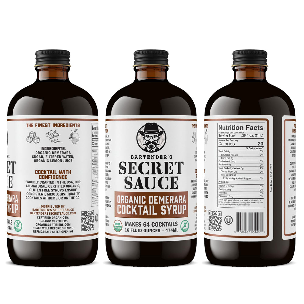 Bartender's Secret Sauce bottle on a bar counter among glassware showing professional use