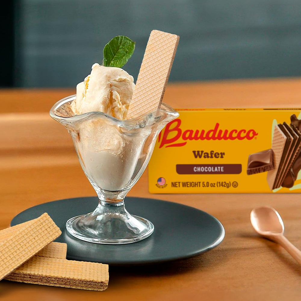 Bauducco pack in hand illustrating size and portable snack benefit