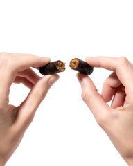 Bean Stalk snack stick being eaten outdoors for convenient on-the-go energy