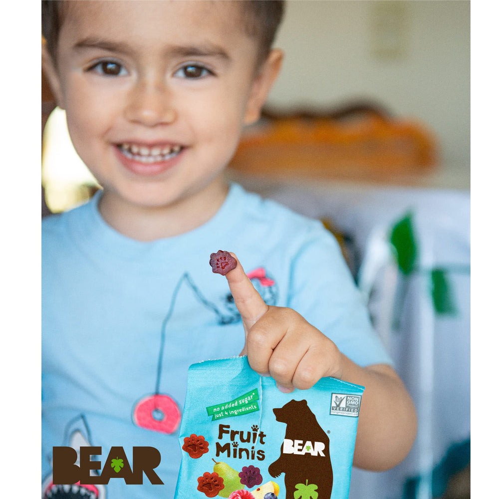 BEAR mini next to fresh berries for scale showing real fruit portion clarity