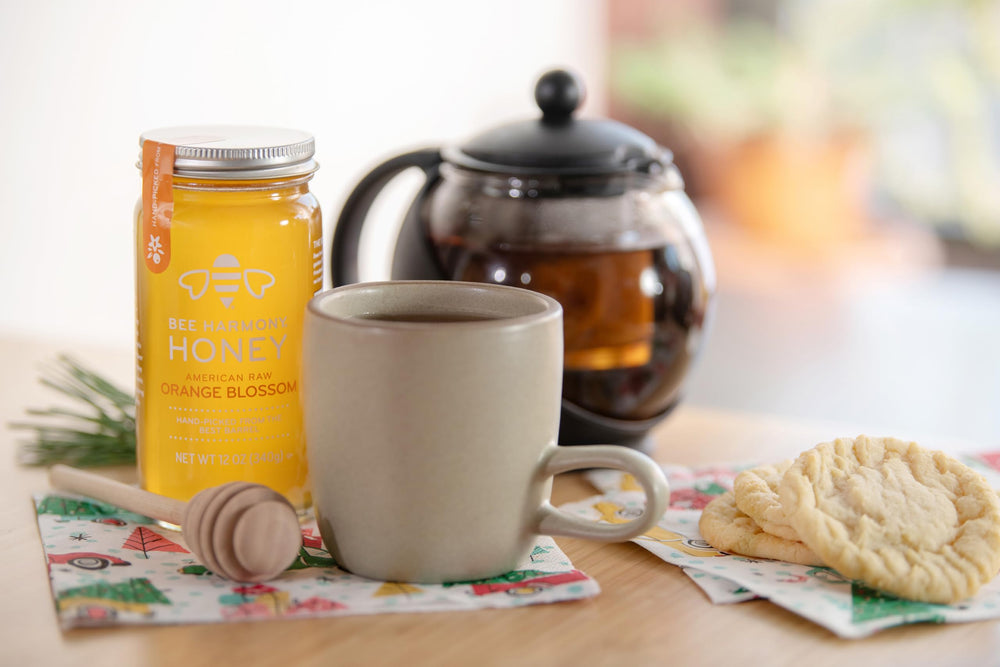Bee Harmony clear glass jar side view highlighting natural color and premium packaging