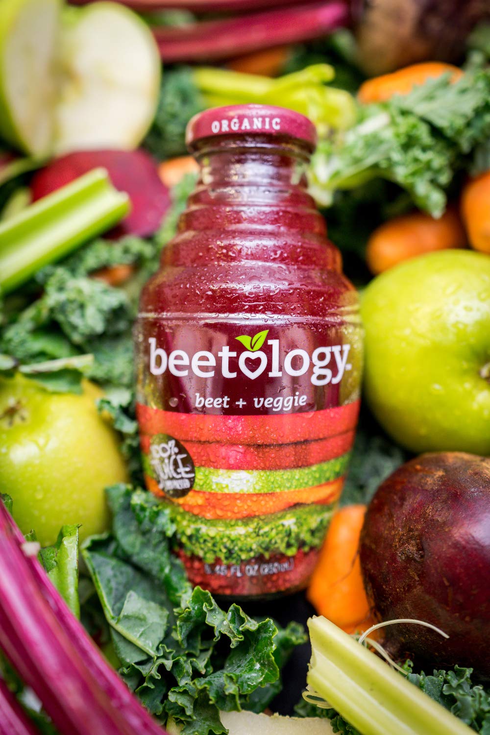 Beetology Beet + Cherry bottle side profile emphasizing rich color and fruit flavor