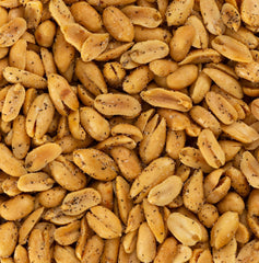 Hand holding Belmont Peanuts to show extra-large Virginia peanut size and scale