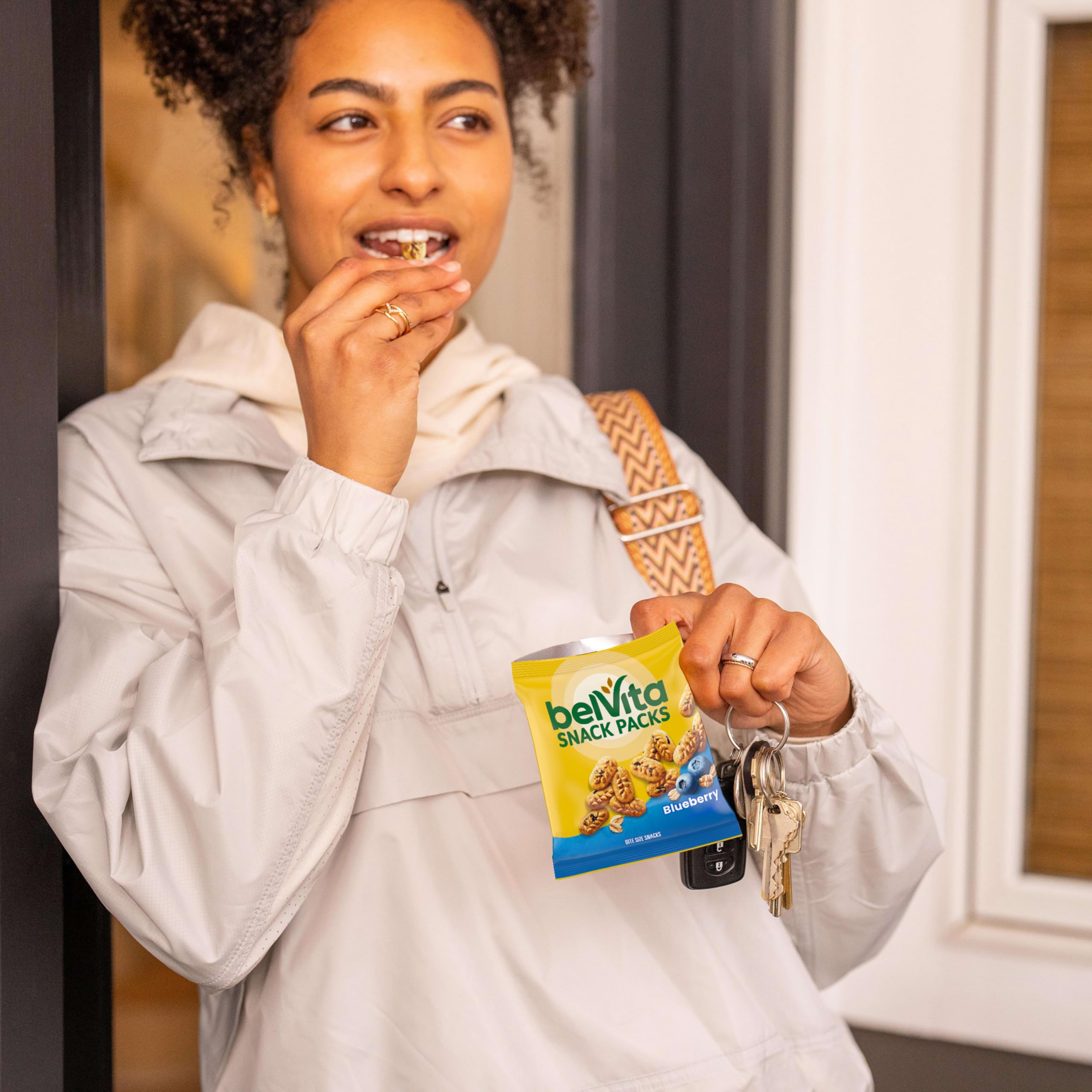 belVita bite pack held in hand showing compact, travel-friendly size
