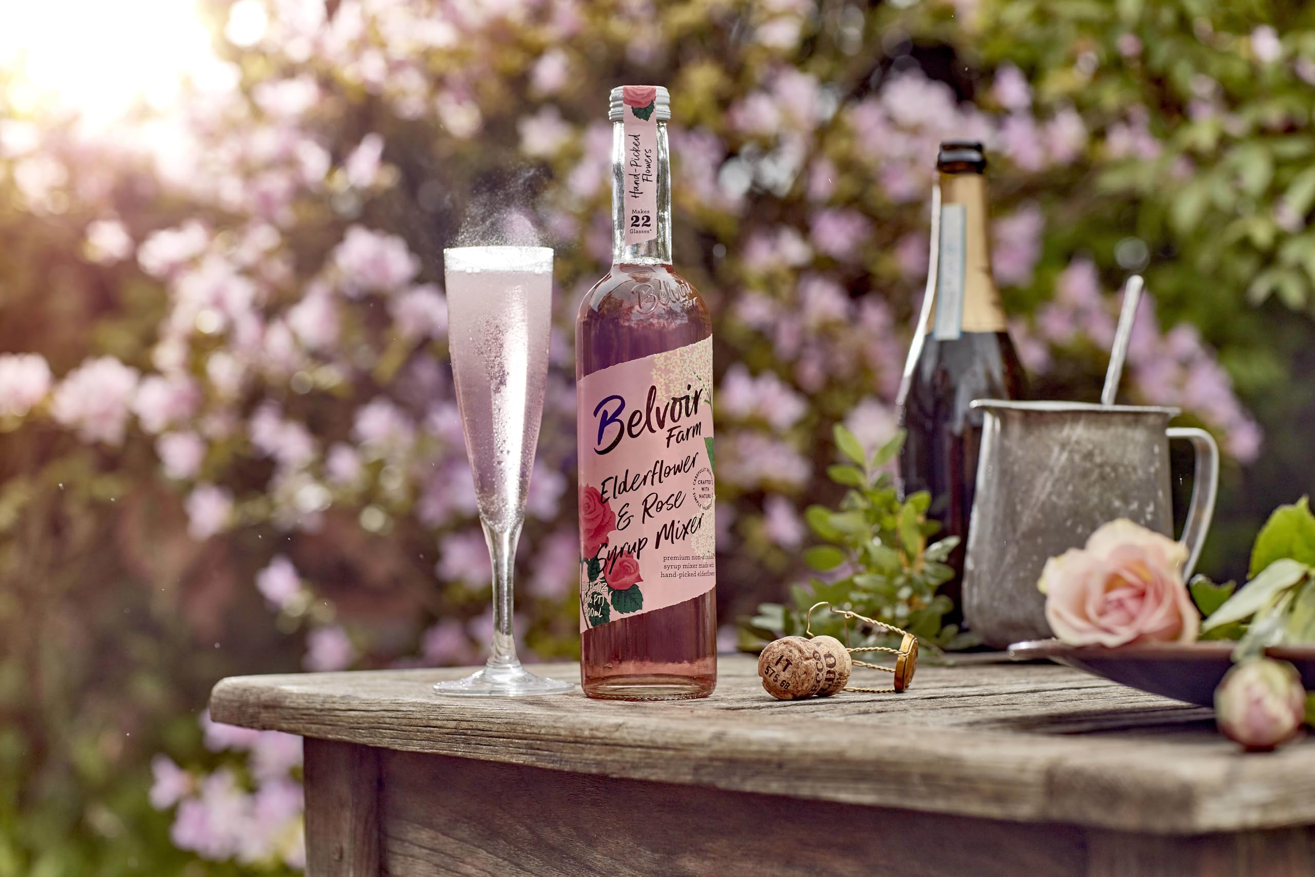BELVOIR FRUIT FARMS bottle beside glass to show 500ml scale and serving suggestion