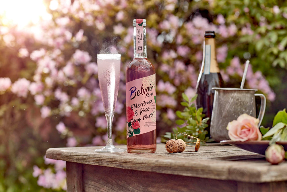 BELVOIR FRUIT FARMS bottle beside glass to show 500ml scale and serving suggestion