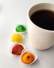 Bergen Marzipan detailed view of one hand-painted fruit piece emphasizing artisan finish