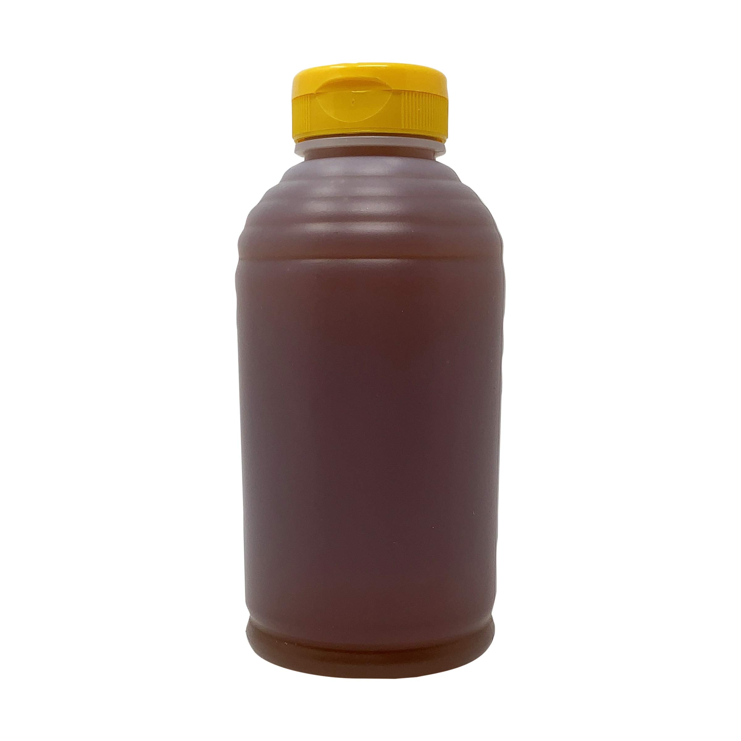 Bernards Apiaries honey pouring close-up showing smooth texture and natural sweetness