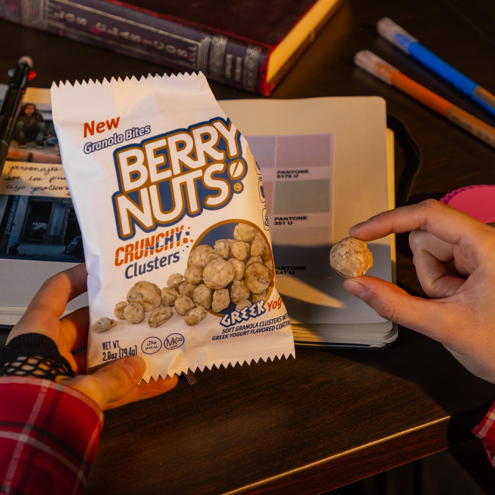 BERRY NUTS pouch in a hand demonstrating the 2.8 oz snack size