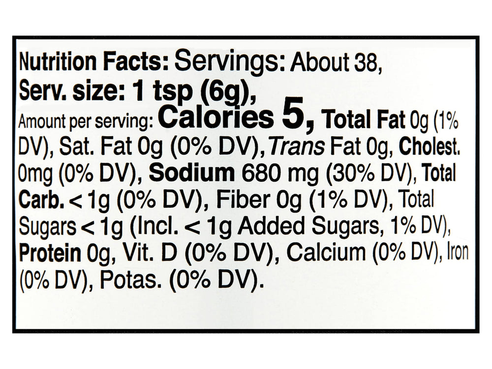 Better Than Bouillon jar next to measuring spoons showing servings scale