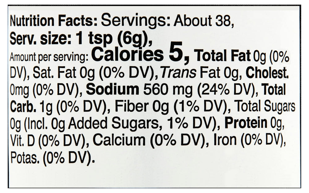 Better Than Bouillon jar beside teaspoon showing compact 8-ounce jar size