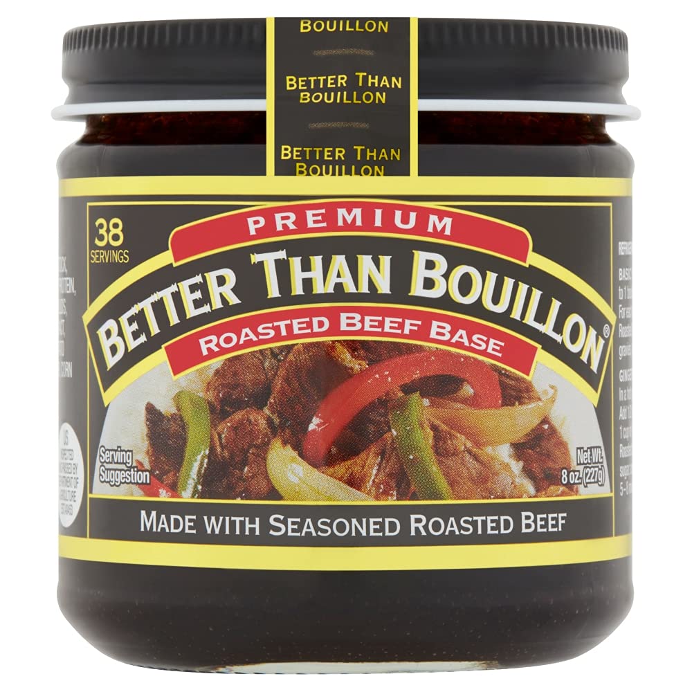 Better Than Bouillon roasted chicken base on spoon from open jar, easy to dissolve and measure