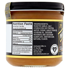 Better Than Bouillon paste on spoon ready to blend for precise seasoning