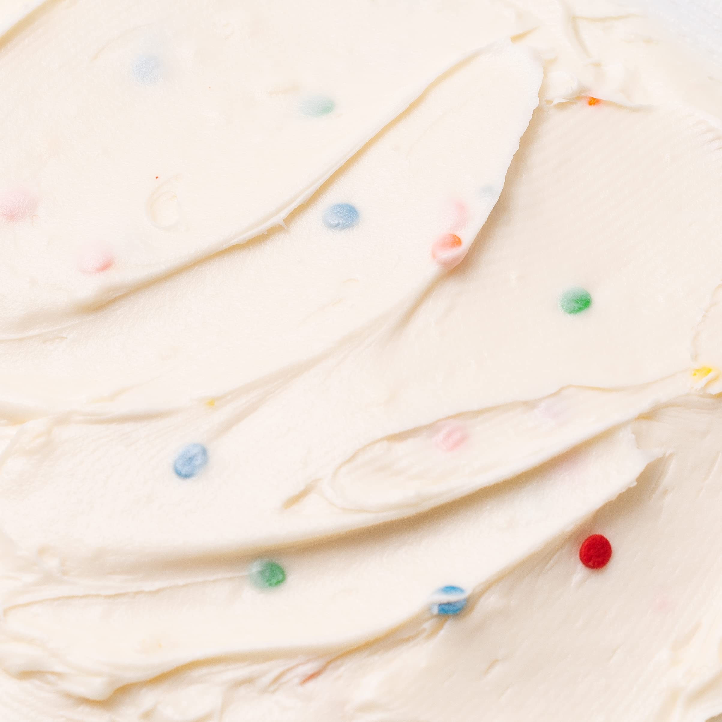 Betty Crocker cookies dipped into frosting on plate showing fun serving idea