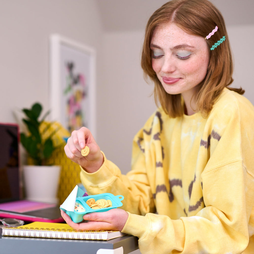 Betty Crocker Dunkaroos tray in hand for scale showing compact single-serve size