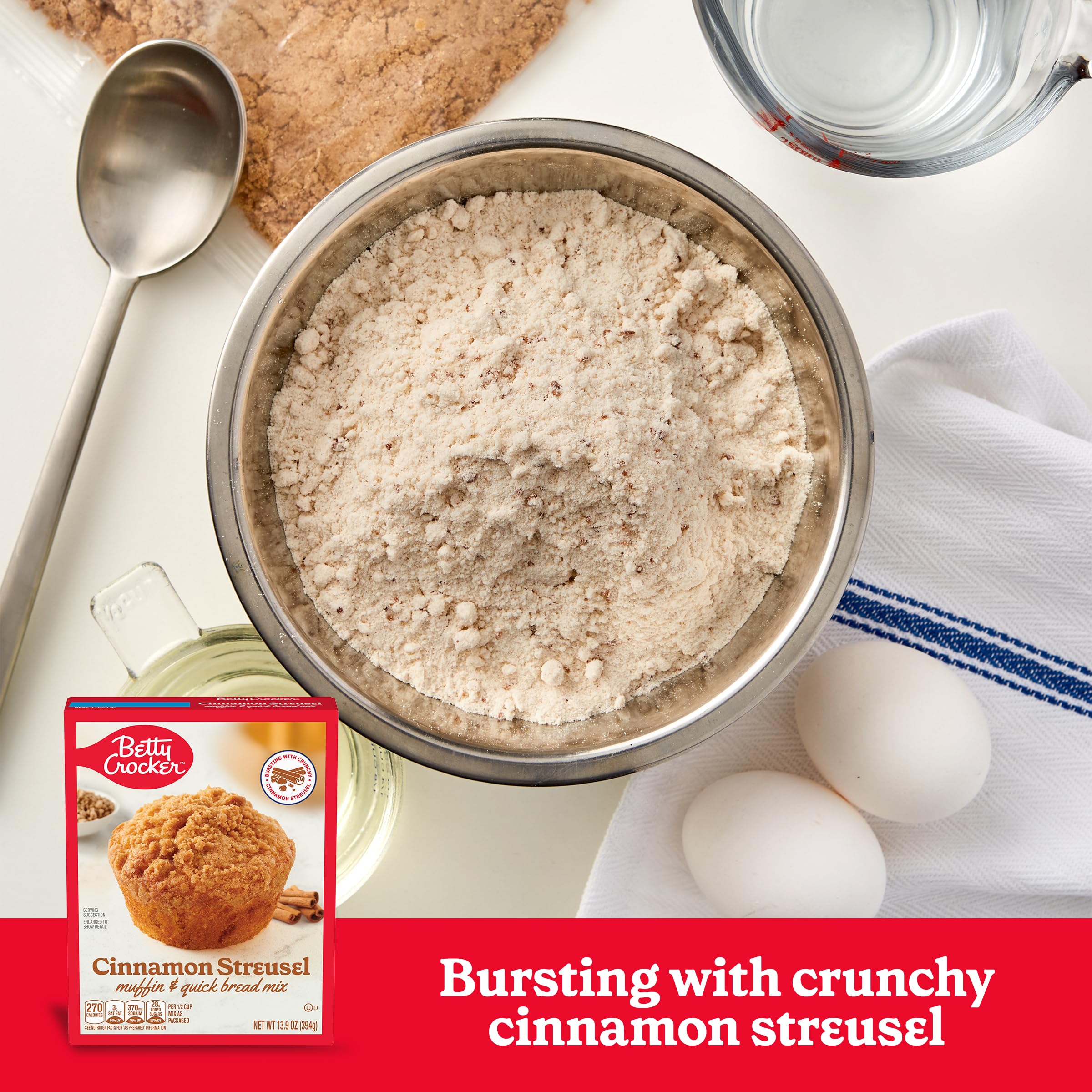 Warm Betty Crocker muffins cooling on a rack with crunchy streusel for tasty breakfasts