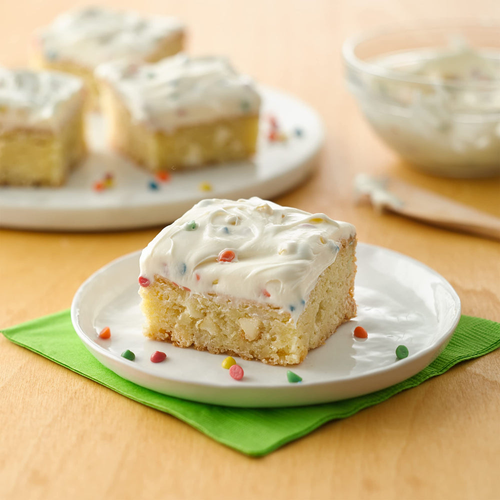 Betty Crocker open can showing creamy texture and rainbow chips for smooth spreading