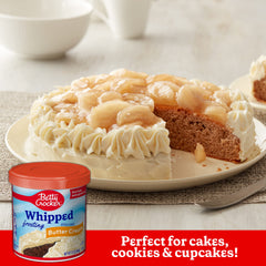 Betty Crocker frosting being spread on a cake, effortless coverage and even finish