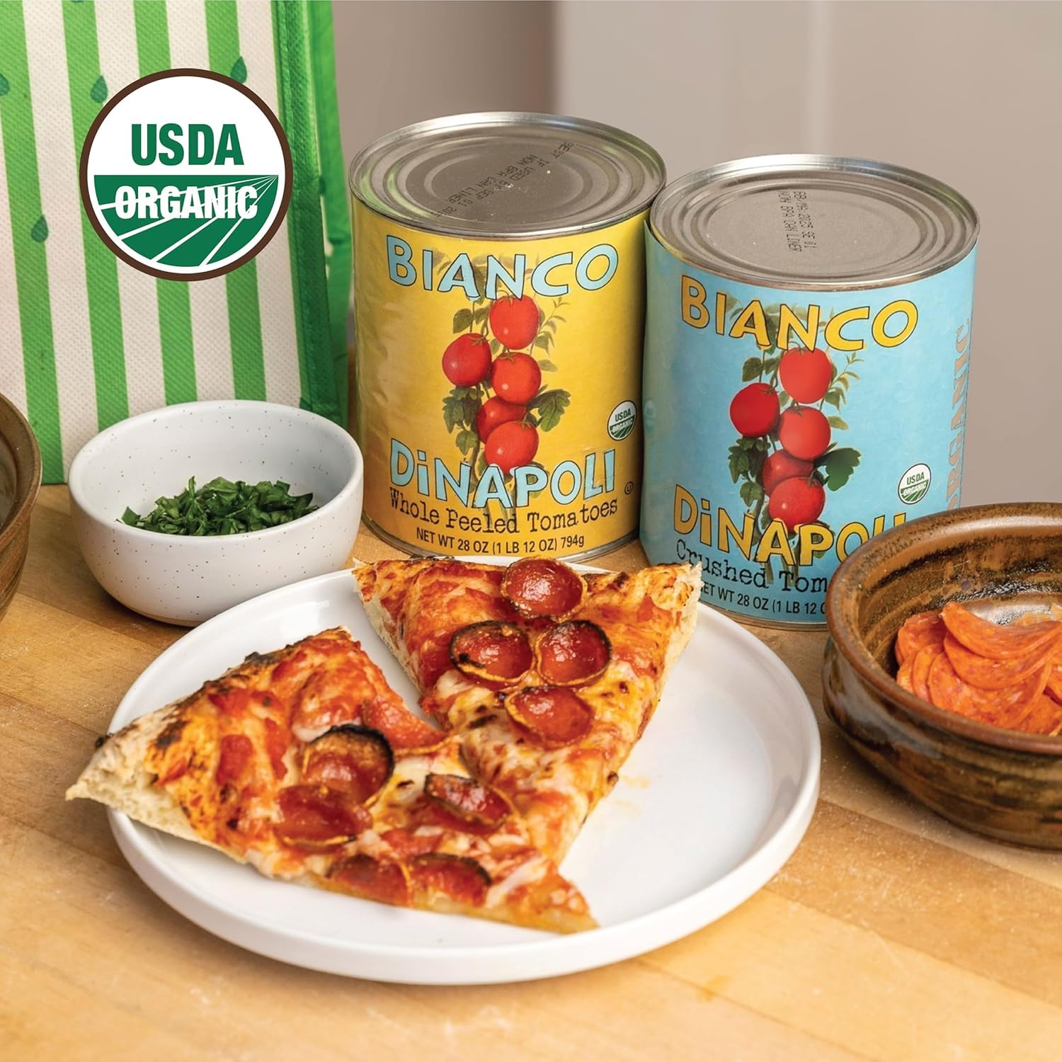 Bianco DiNapoli crushed tomatoes in kitchen setting, inspirational meal-building benefit